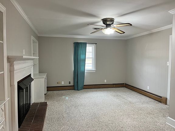 Den, Adjacent to kitchen