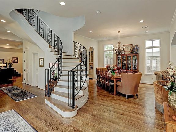 Custom wood flooring throughout the entire open concept home