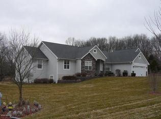 5877 Summerset Woods Dr SE, Alto, MI 49302