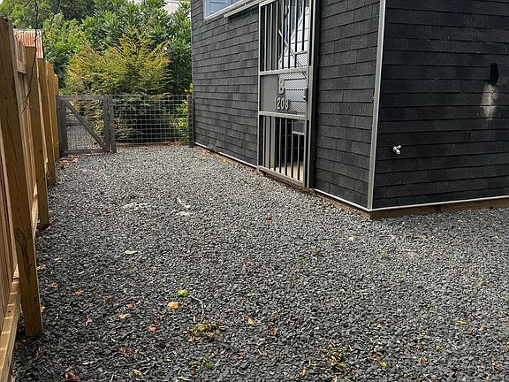 Dedicated parking space, sliding locked gate for security. Motion detection light upon arrival.