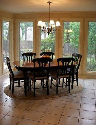 Beakfast area with lots of light and backyard view
