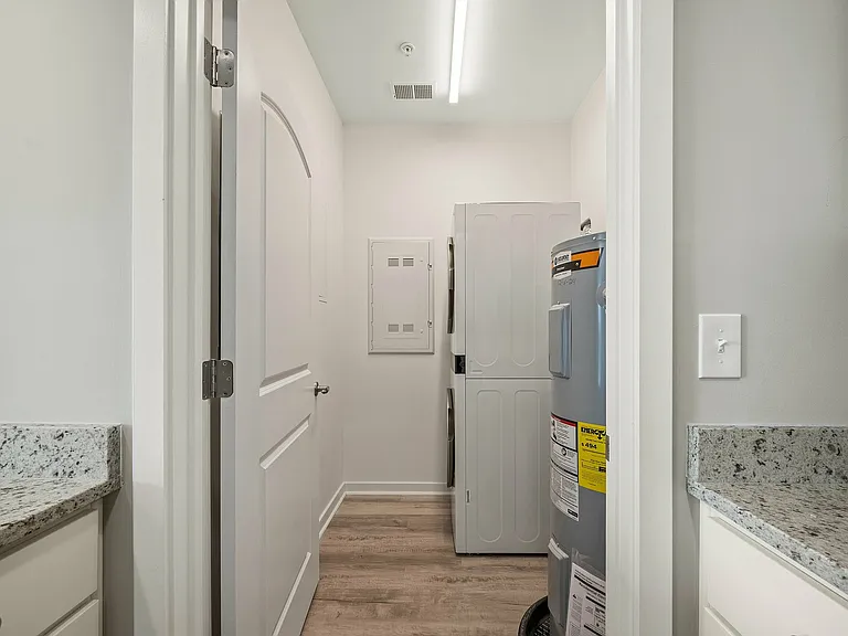 Experience functionality and style in this thoughtfully designed laundry area.