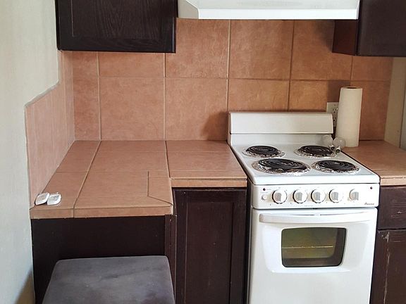 Kitchen - replace small stove with regular size 30"-full siz
