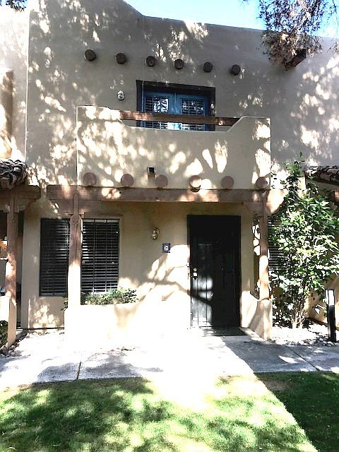 Front door with locked metal screen door allows you to let seasonal breezes in!