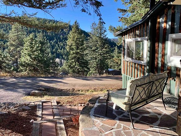 Serene view from the front porch. Though the winter may be cold, the sun still shines with warmth on the front porch.