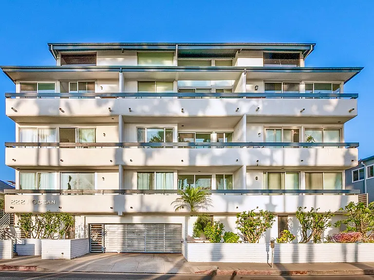 Contemporary mid-rise community at 2221 Ocean Avenue _ prime beachside location.