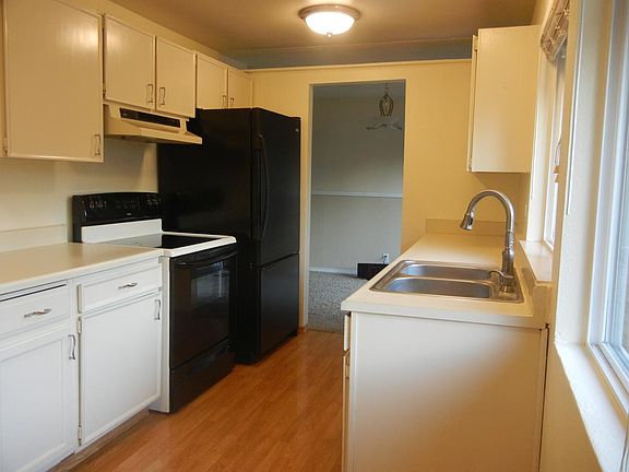 Kitchen has a nook, ideal for a table or desk