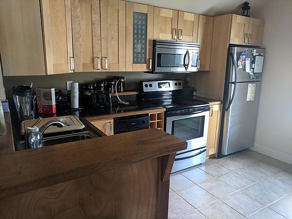 Kitchen with all appliances including dishwasher