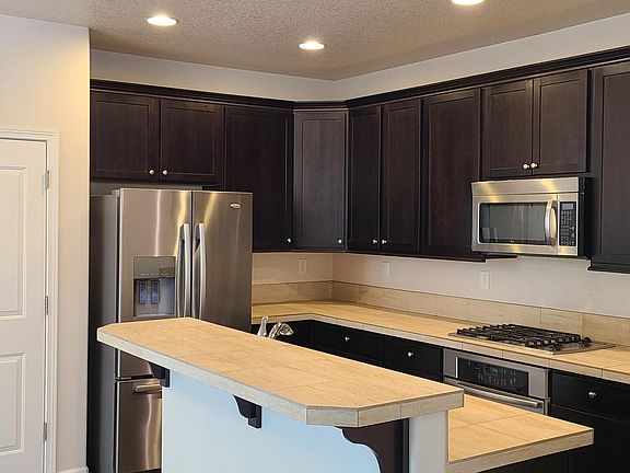 Kitchen with stainless steel appliances