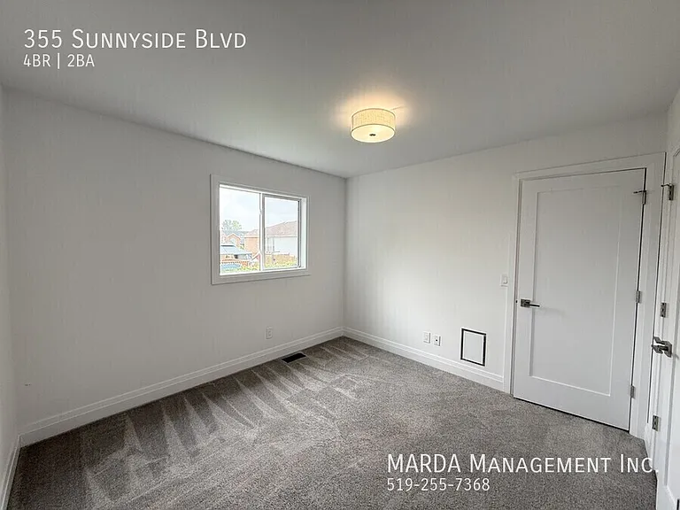 355 Sunnyside Blvd — Photo 30