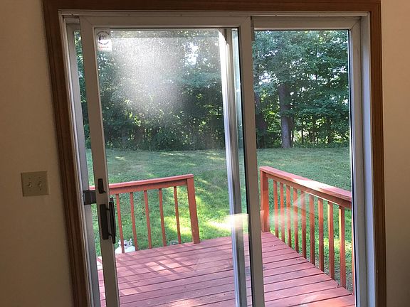 Recently winterized sliding glass door and windows to reduce