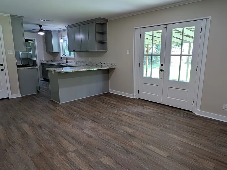 Dining area and french doors to backyard