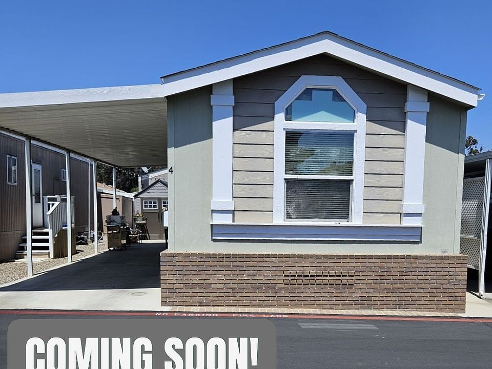 Home presents excellent curb appeal. A covered carport offers protected parking, while additional outdoor storage adds practical value. With its low-maintenance exterior and welcoming appearance, this property is perfect for comfortable, easy living.