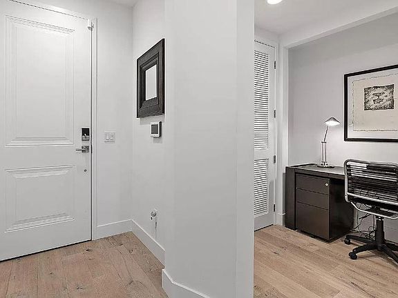 Zoom room/home office adjacent to washer/dryer.