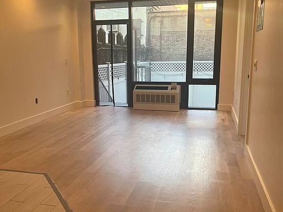 3rd image of 399 E 8th St APT 1A