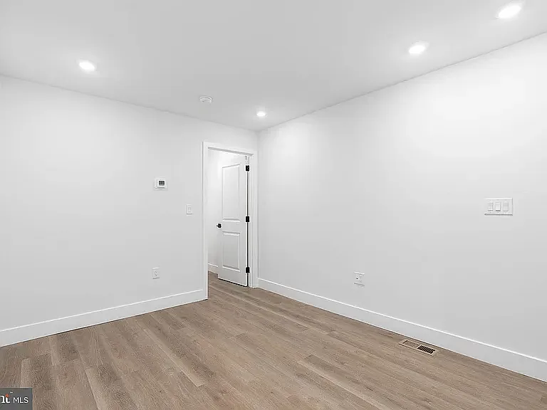 Door to first floor living suite. Off of flexible living space.