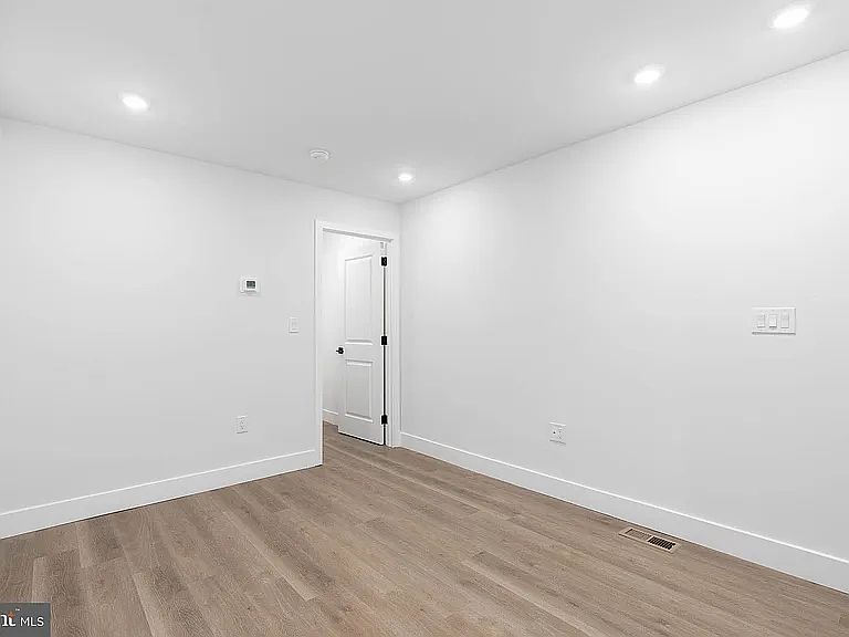 Door to first floor living suite. Off of flexible living space.
