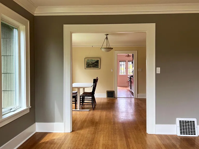 open floor plan with views from living room through dining room to open gourmet kitchen