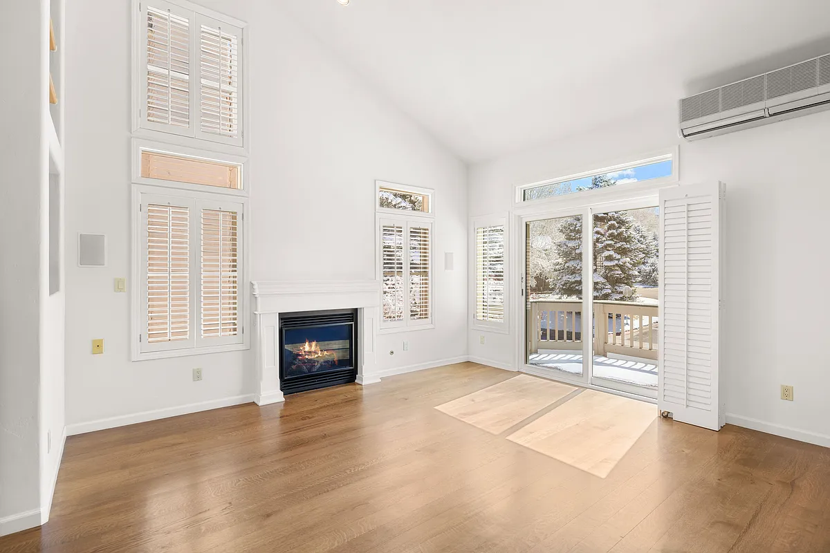 Vaulted ceilings with real wood shutters, hard wood floors with radiant heat through out, with trex deck balcony - 1514 Mockingbird Ln #1514
