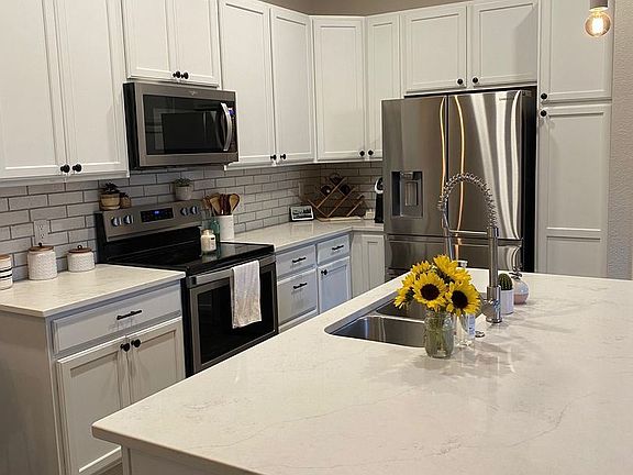5th image of 15345 W 64th Ln Unit 103