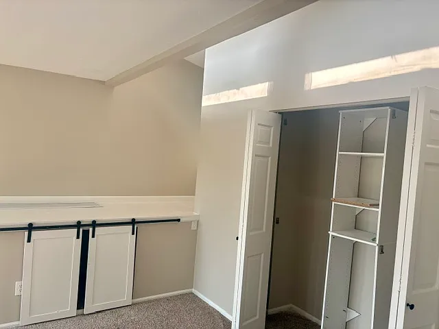 Master Bedroom closet and sliding doors for additional storage