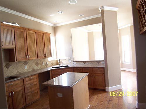 Kitchen w/ granite countertops