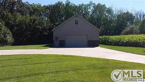 1280 square foot pole barn. High Ceilings, Large garage door. Connects to circular drive. Store your boat, RV, hunting gear, fishing gear, summer only vehicles, tractors, motorcycles or other equipment here! Excellent condition.