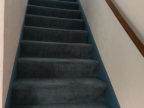 Stairs to bedrooms and bath