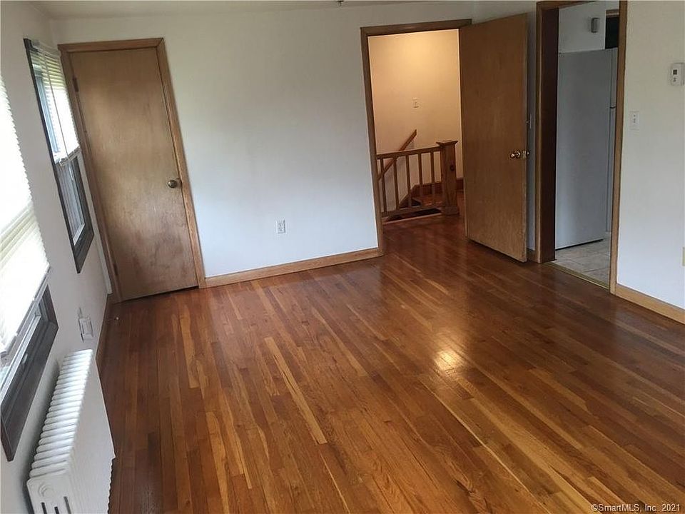 2nd floor unit, living room with kitchen, bathroom and bedroom to the right.