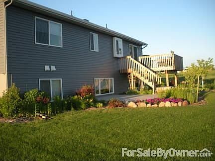 Back of house : Deck and patio More perennials