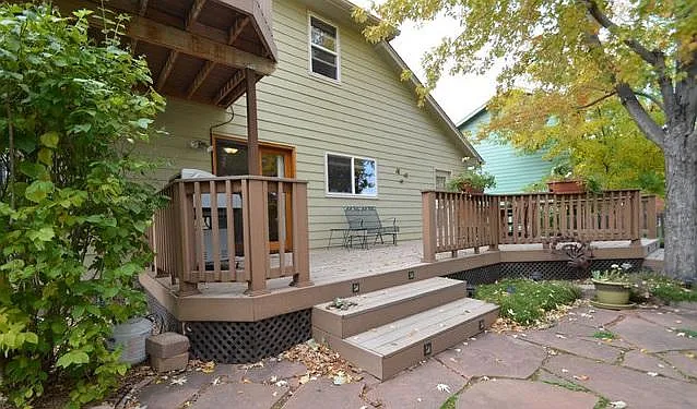 Mature trees adorn this deck for shade and privacy