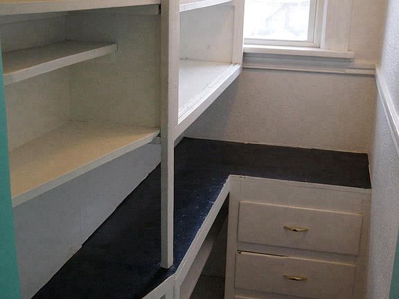 Pantry just off the kitchen with loads of storage space