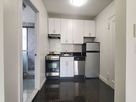 2nd image of 61 W 8th St APT 4F