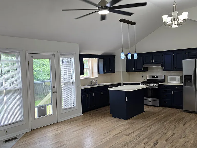 Kitchen with newly refinished wood floors