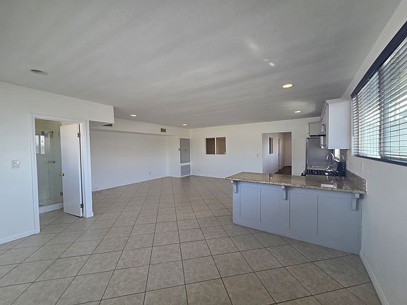Open Concept Living Area, Kitchen, Dining Area and 3/4 Bathroom