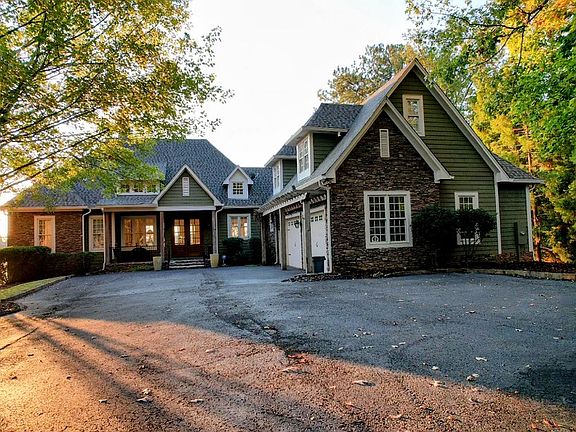 Upper driveway with 2-car garage