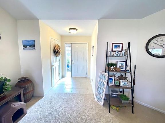 Spacious Foyer includes Coat Closet and Full-Glass Storm Door