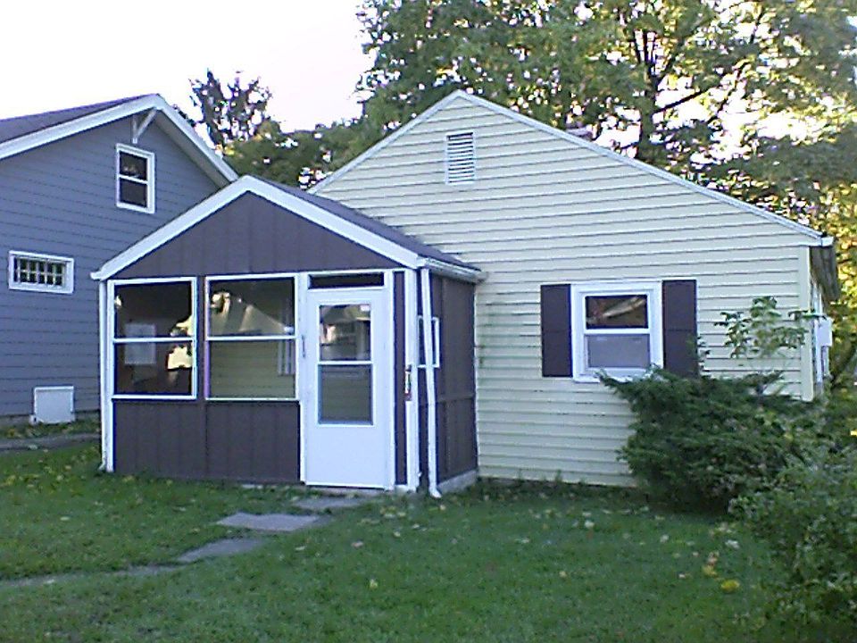 Front enclosed porch. Screens and windows! 