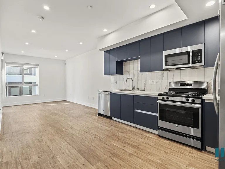 Open-Concept Kitchen, Dining, and Living Room Space