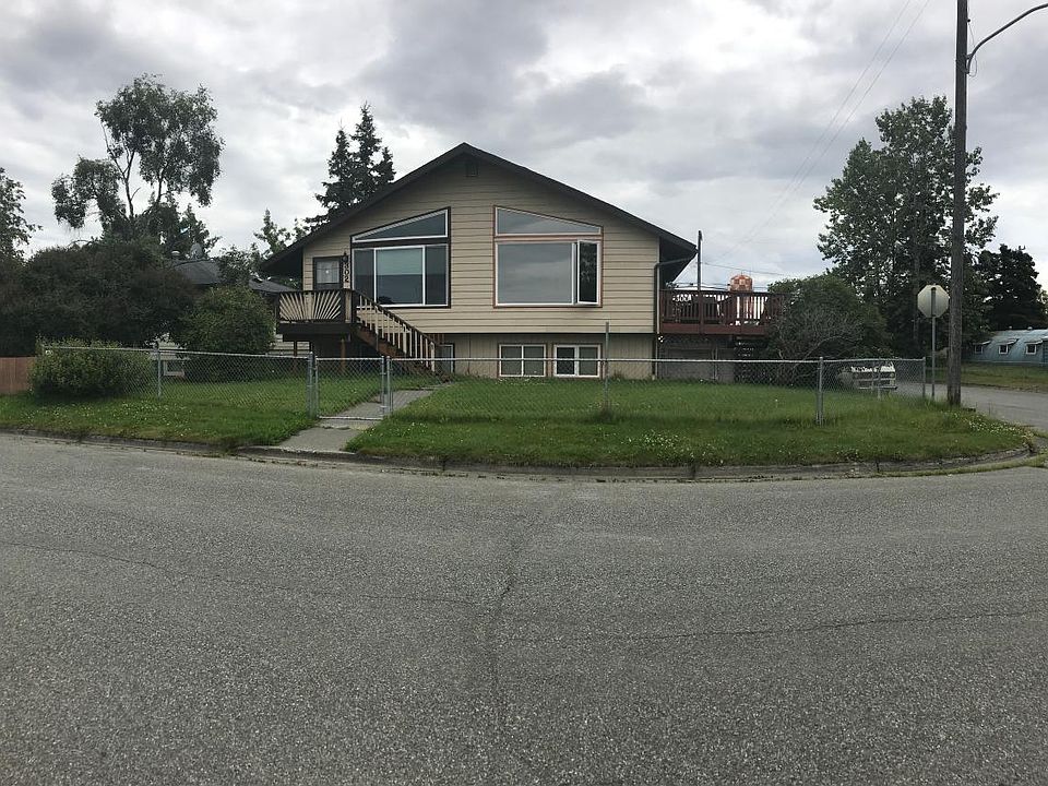 Front view of the duplex and private yard