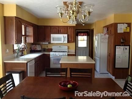 Kitchen with island
						:
						Newer Appliances and Faucet
9X13 (doesn't include dining area in measurement)