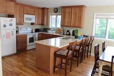 Large, Clean Airy Kitchen for entertaining and dining with y
