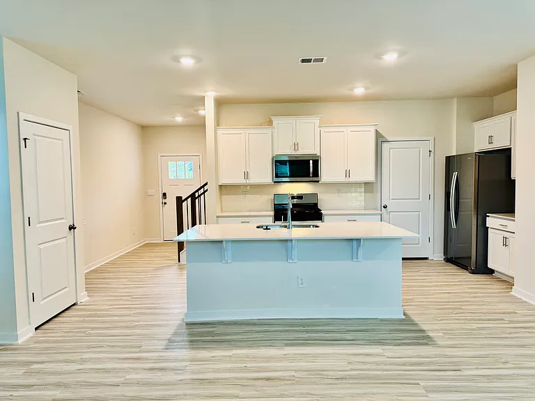 Plenty of cabinet space, and a coat closet pictured at the left.