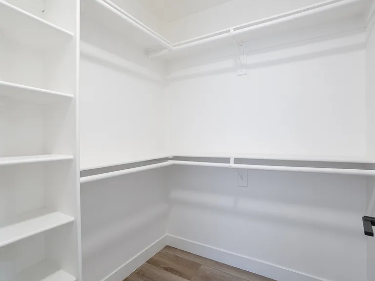 Walk in closet in master bedroom