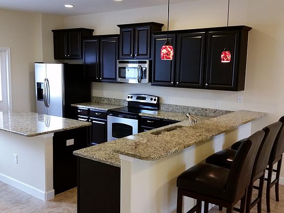 Kitchen (stainless steel appliances, marble countertops)