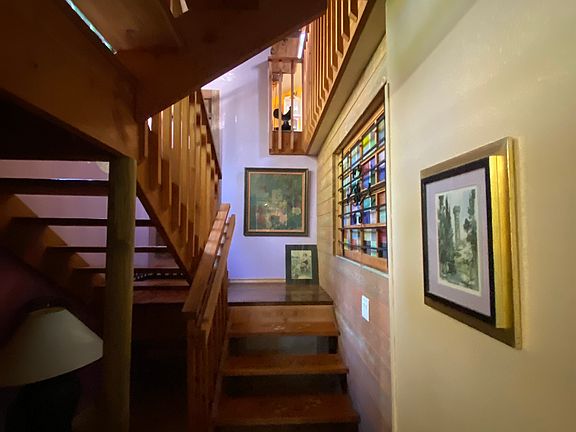 Stairwell transition between entry room and living quarters