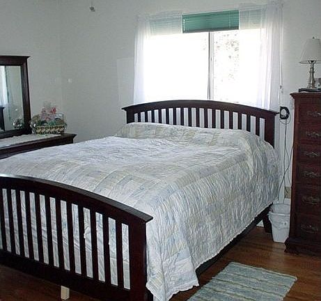Master Bedroom with refinished hardwood floors