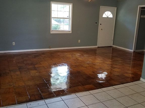 Front door entrance into living room.