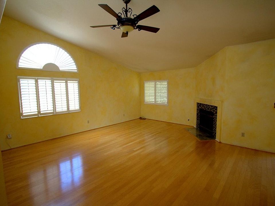 Pecan hardwood floors and Mediterranean faux paint