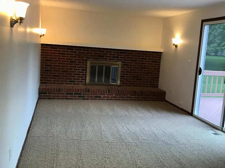 Family room with wood burning fireplace